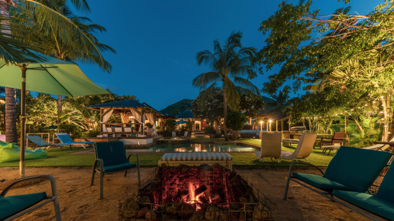 shanti-ghar-guest-house-tamarin-mauritius-pool-view-garden-outdoor-space-location-tropical-exterior-stay-kiosk-sunbed-area-peaceful-bonfire